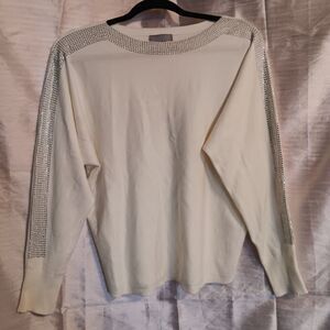 LIV cream colored sweater with crystal Embellished sleeves and collar